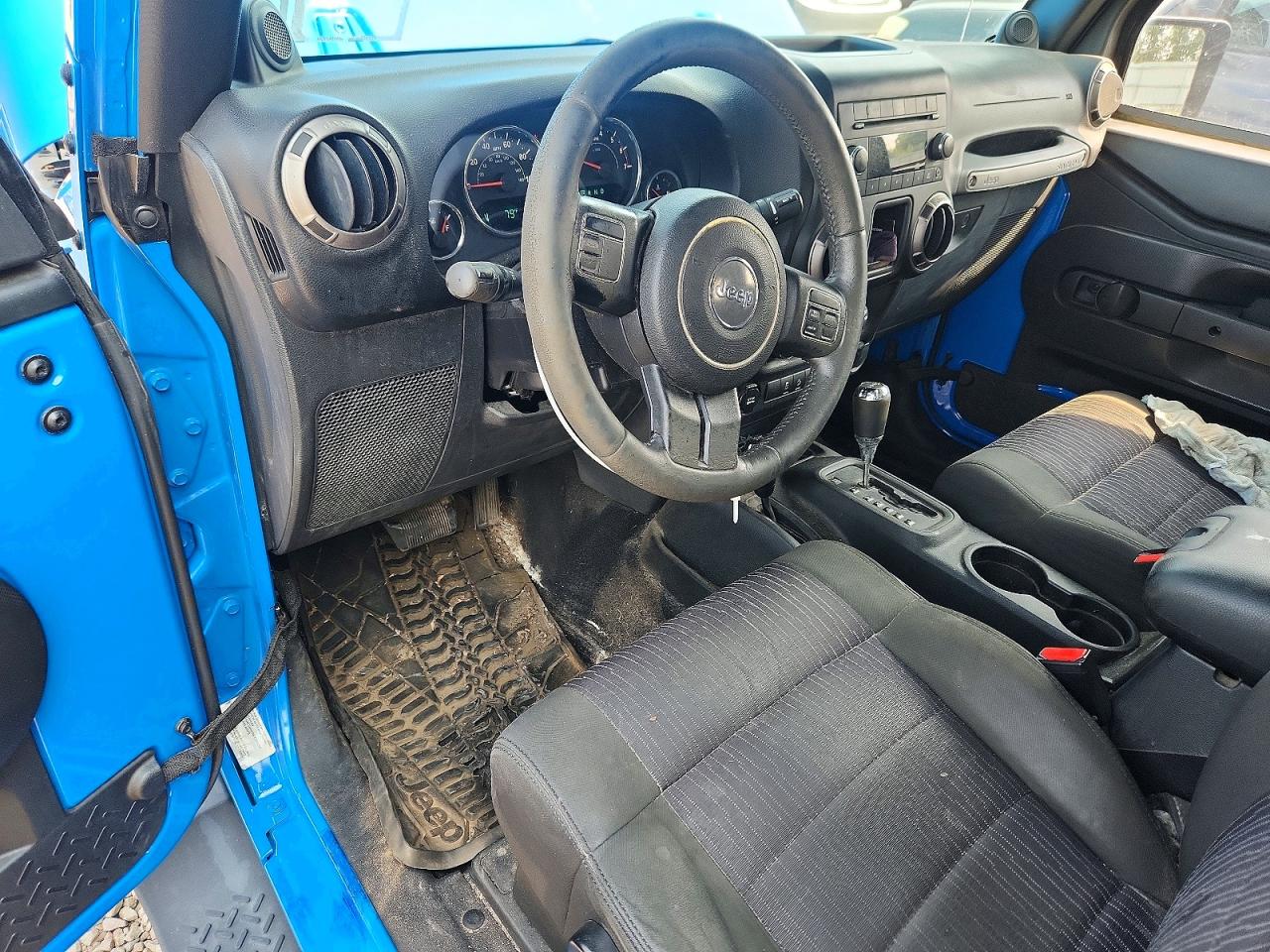 1J4AA2D11BL555468 · 2011 JEEP WRANGLER · 8/12
