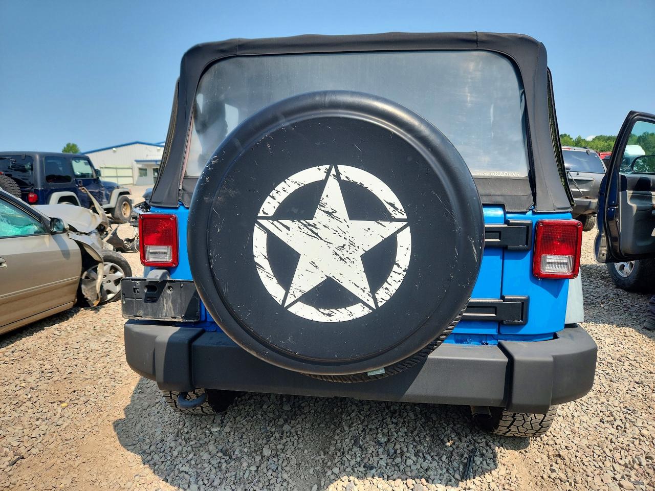 1J4AA2D11BL555468 · 2011 JEEP WRANGLER · 6/12