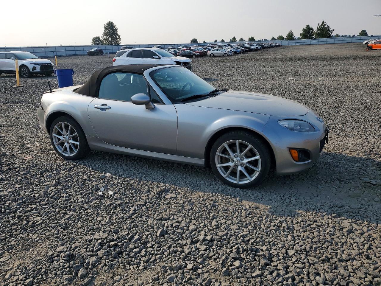 JM1NC2LF9B0215243 · 2011 MAZDA MX-5 MIATA · 4/12