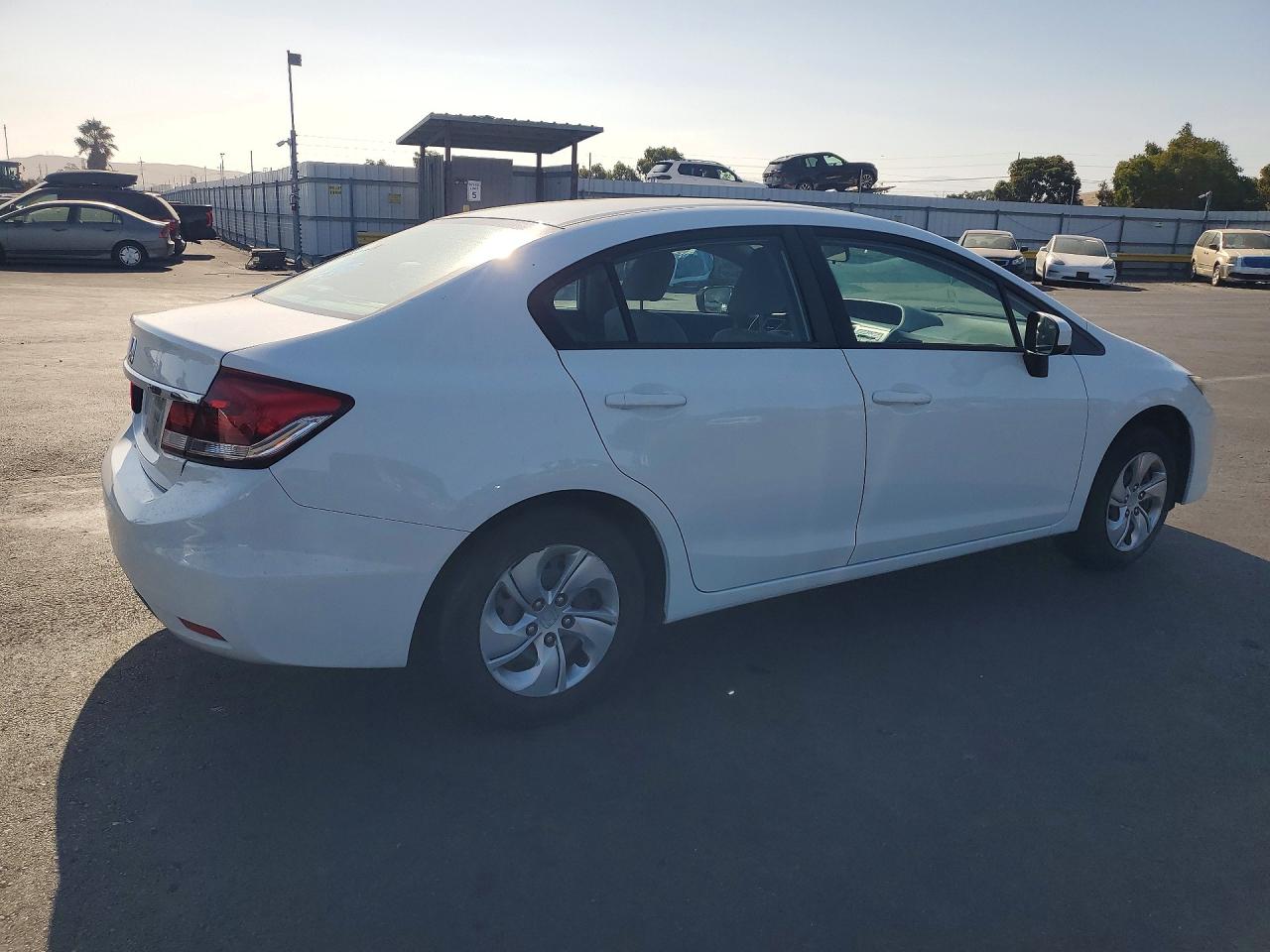 2HGFB2F51FH512018 · 2015 HONDA CIVIC · 3/12
