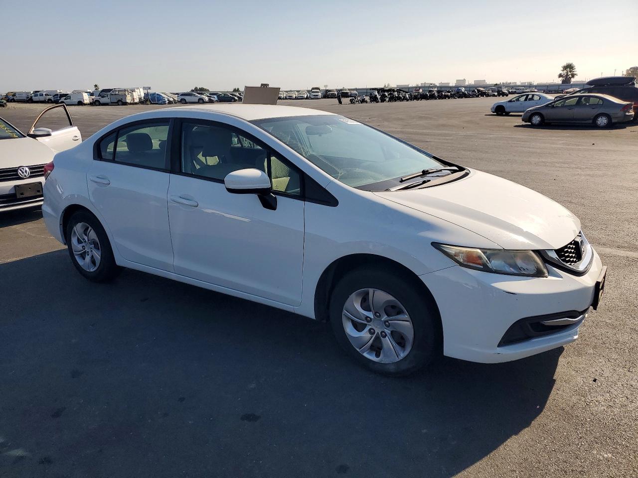 2HGFB2F51FH512018 · 2015 HONDA CIVIC · 4/12