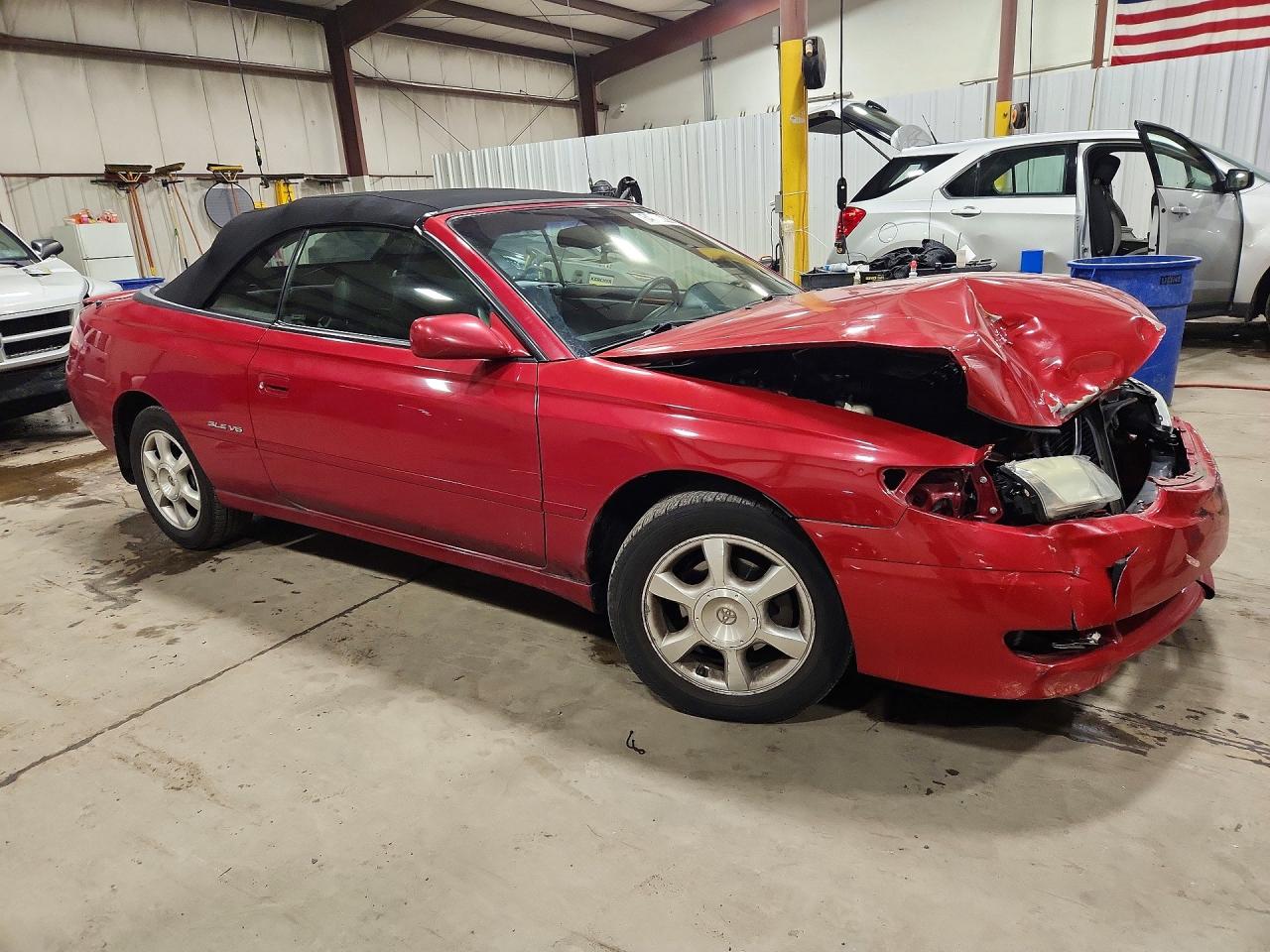 2T1FF28P12C571169 · 2002 TOYOTA CAMRY SOLARA · 4/13