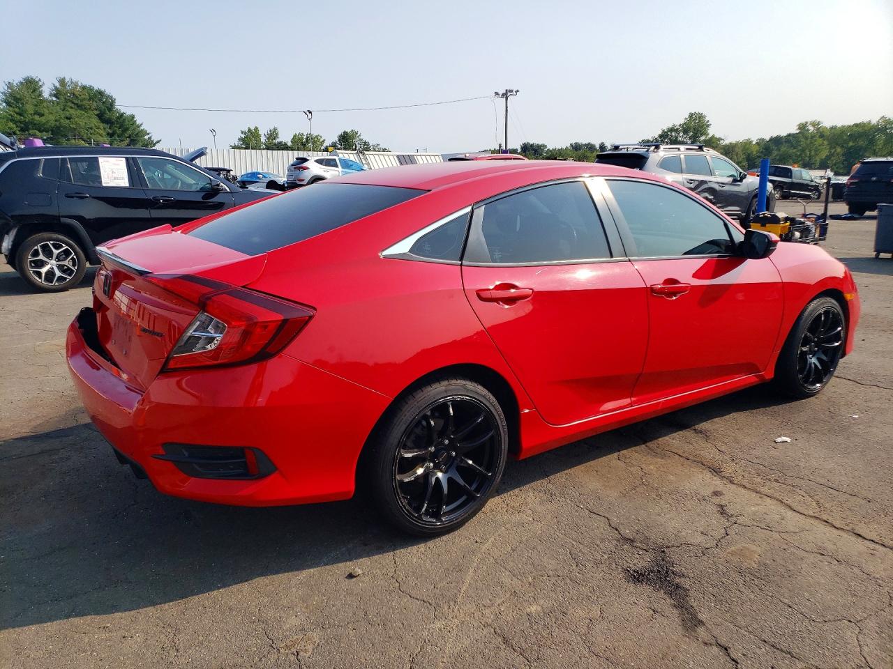 2HGFC2F84KH516596 · 2019 HONDA CIVIC · 3/13