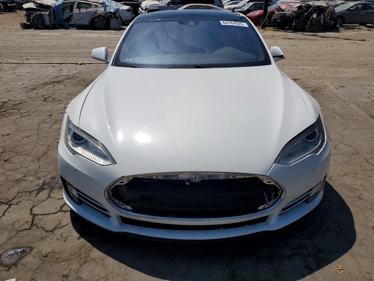5YJSA1E49GF124982 · 2016 TESLA MODEL S · 5/13