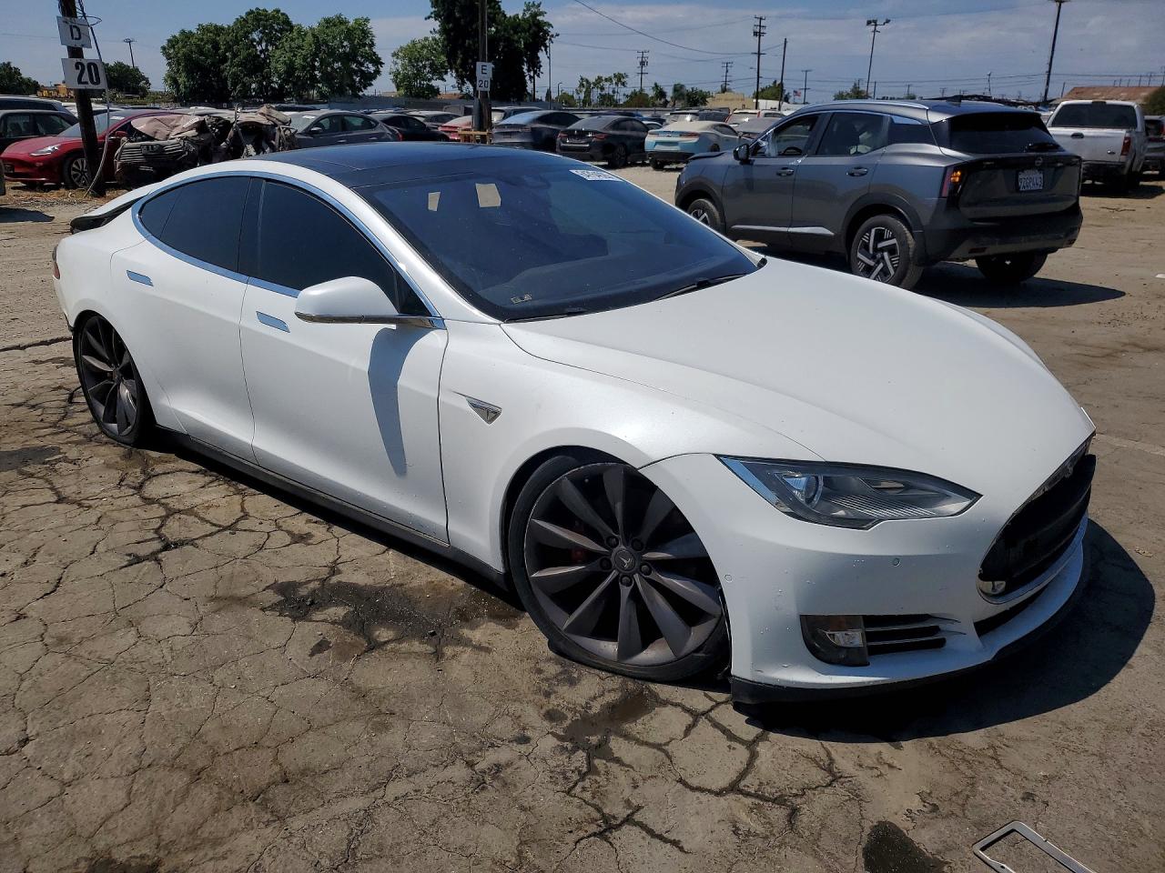 5YJSA1E49GF124982 · 2016 TESLA MODEL S · 4/13