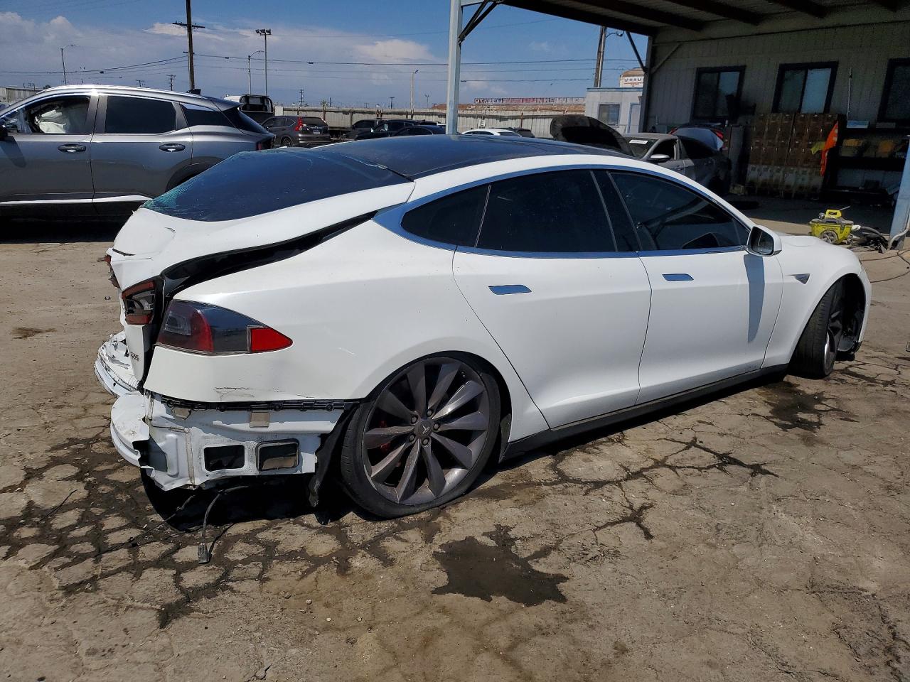5YJSA1E49GF124982 · 2016 TESLA MODEL S · 3/13