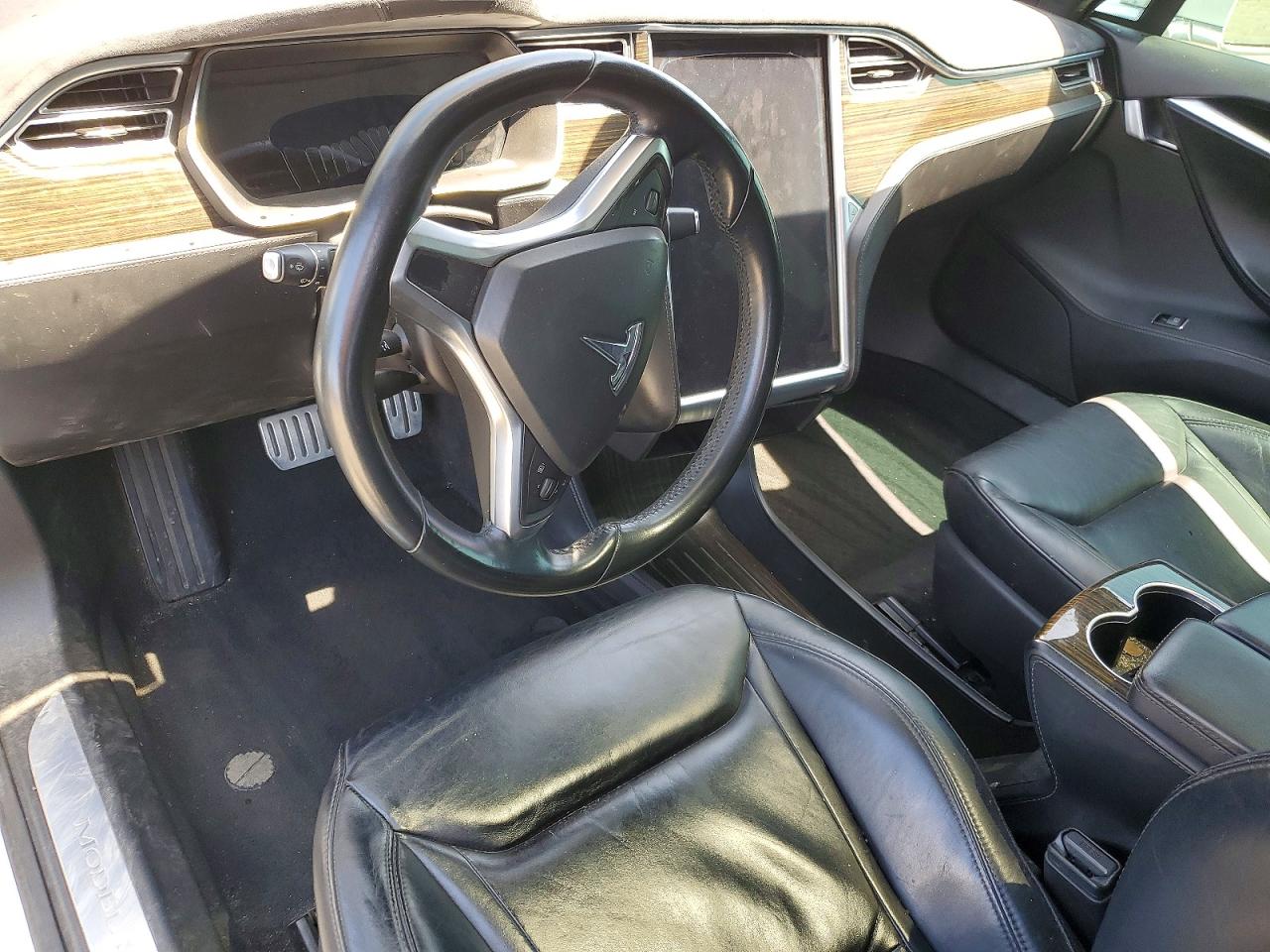 5YJSA1E49GF124982 · 2016 TESLA MODEL S · 8/13