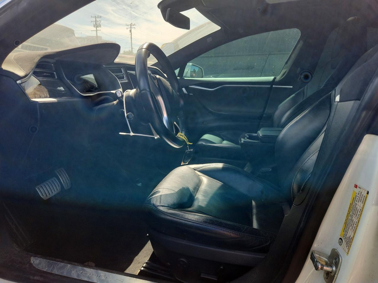 5YJSA1E49GF124982 · 2016 TESLA MODEL S · 7/13