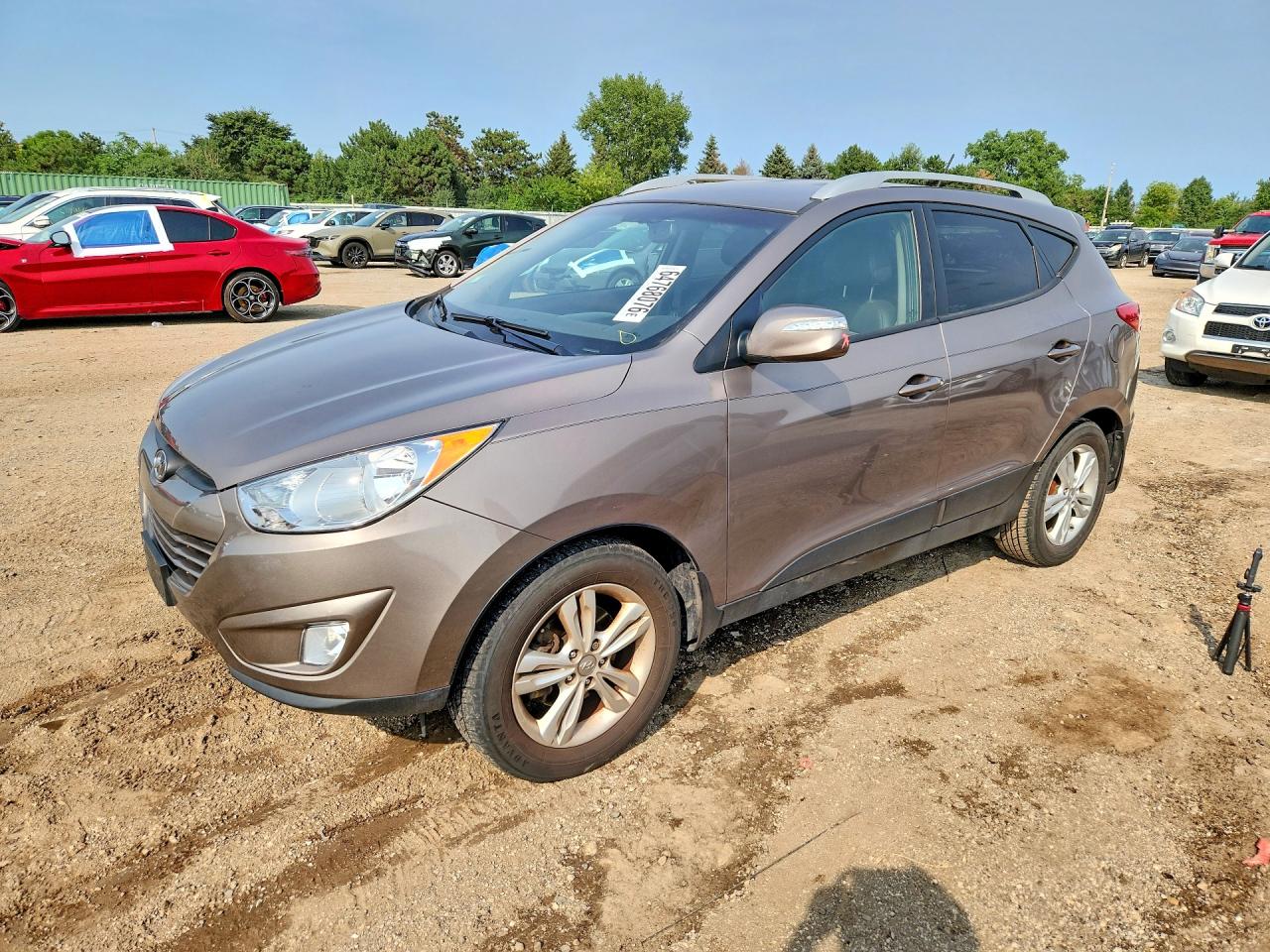 KM8JUCAC1DU617002 · 2013 HYUNDAI TUCSON