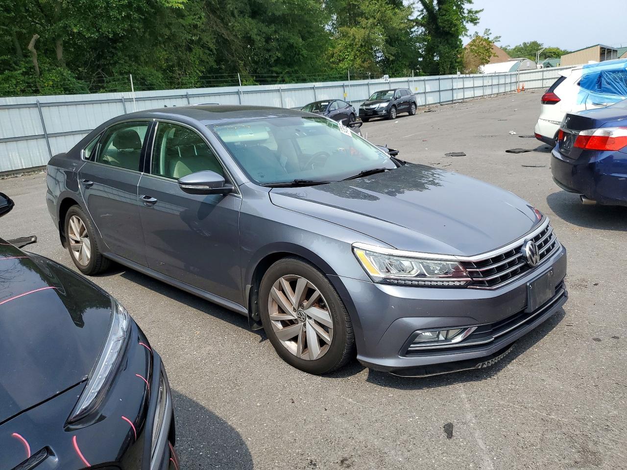 1VWBA7A3XJC044124 · 2018 VOLKSWAGEN PASSAT · 4/13