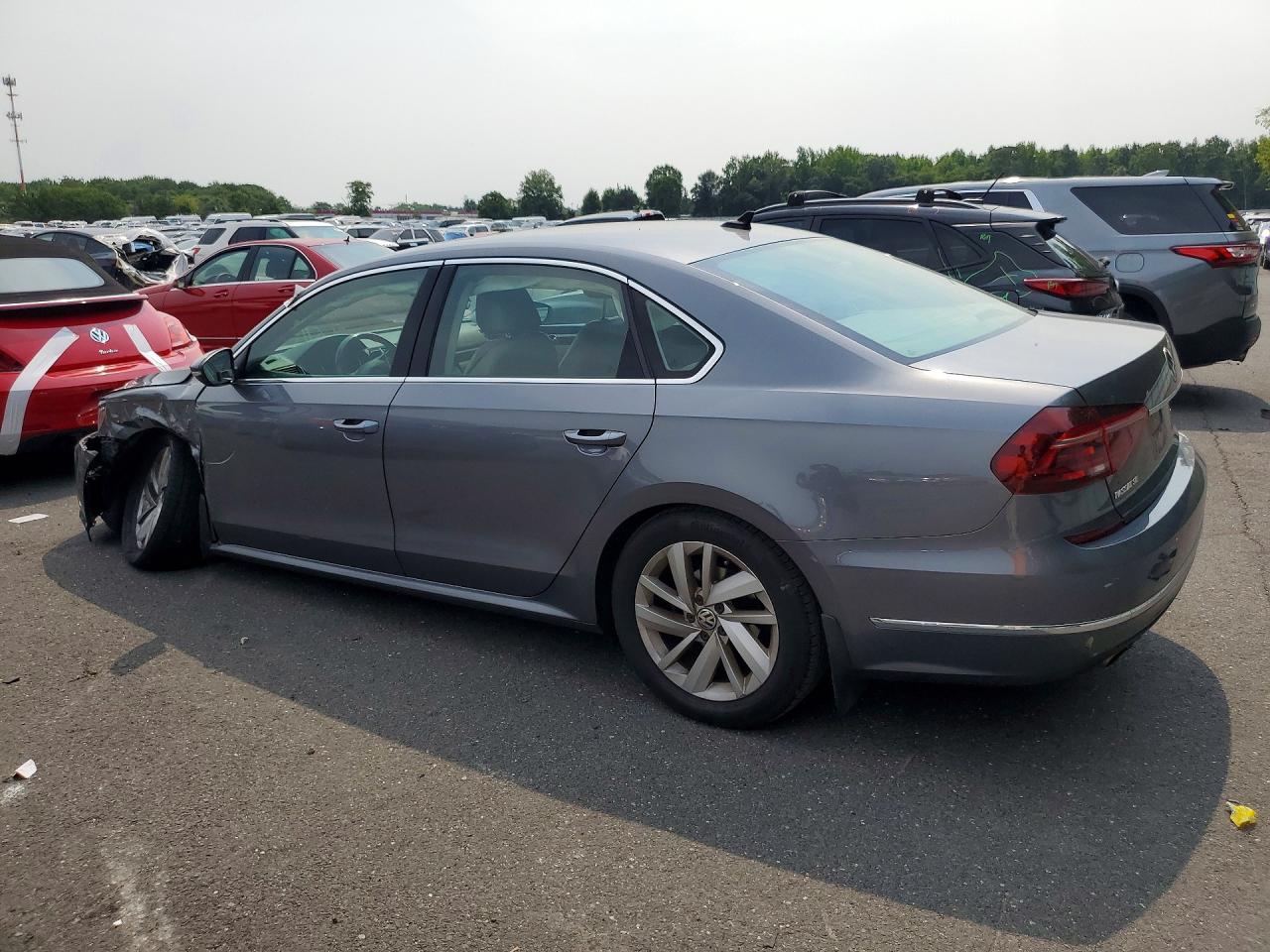 1VWBA7A3XJC044124 · 2018 VOLKSWAGEN PASSAT · 2/13