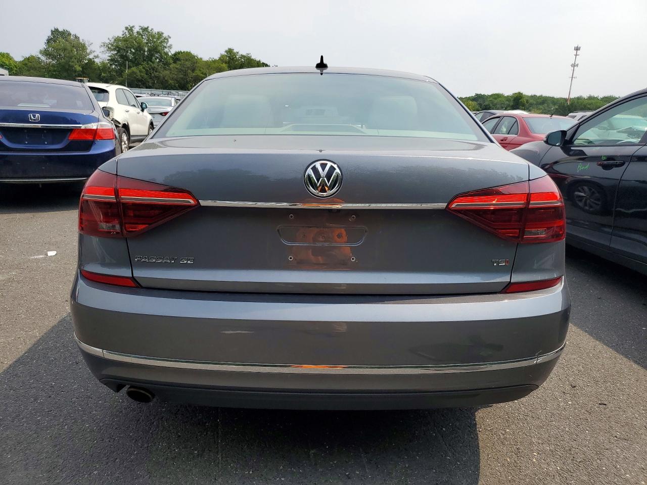 1VWBA7A3XJC044124 · 2018 VOLKSWAGEN PASSAT · 6/13