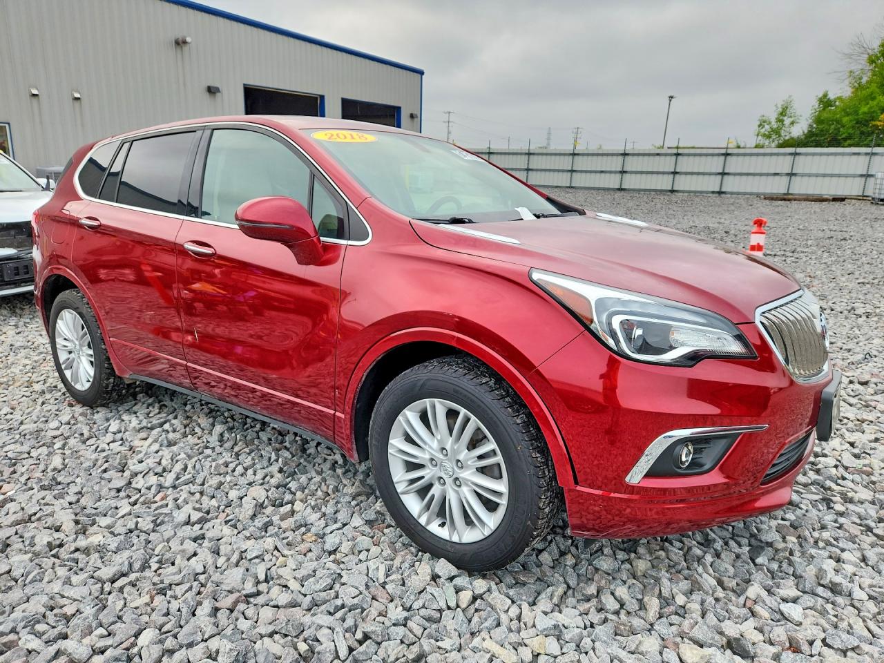 LRBFXCSA2JD028646 · 2018 BUICK ENVISION · 4/13