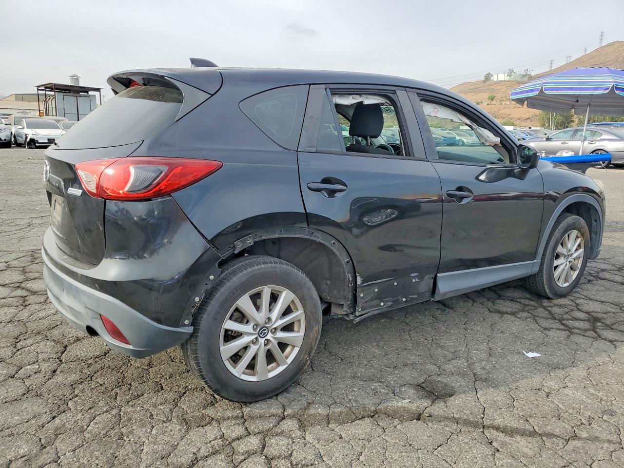 JM3KE2BE2F0494697 · 2015 MAZDA CX-5 · 3/13