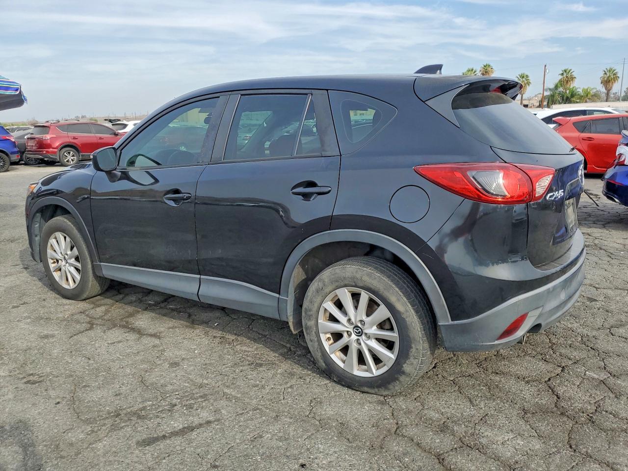 JM3KE2BE2F0494697 · 2015 MAZDA CX-5 · 2/13