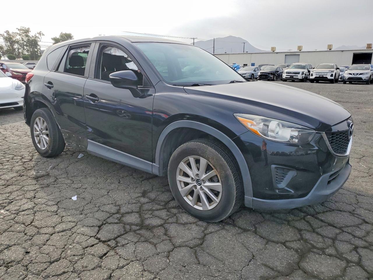 JM3KE2BE2F0494697 · 2015 MAZDA CX-5 · 4/13