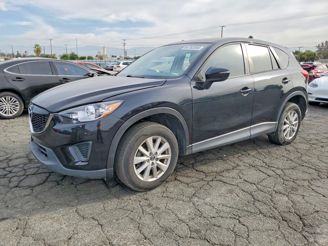 JM3KE2BE2F0494697 · 2015 MAZDA CX-5