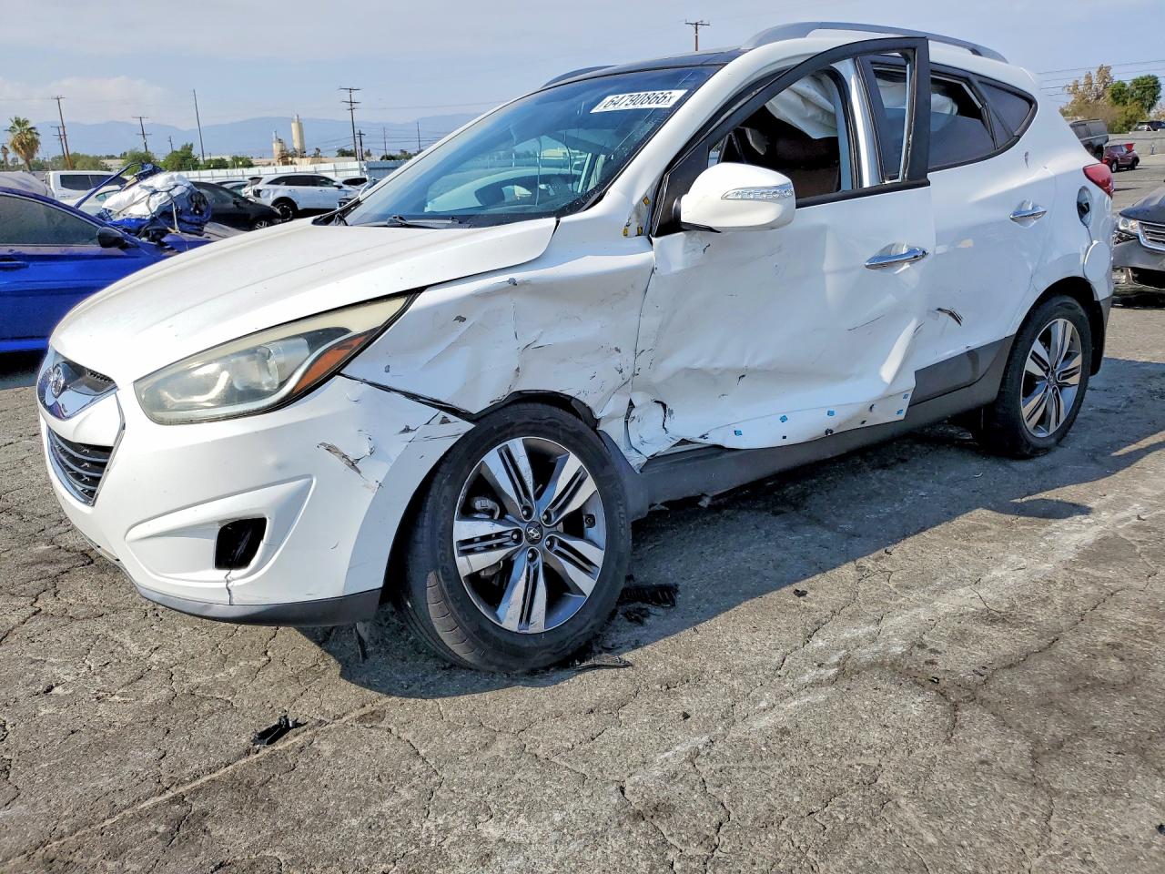 KM8JU3AGXFU061309 · 2015 HYUNDAI TUCSON