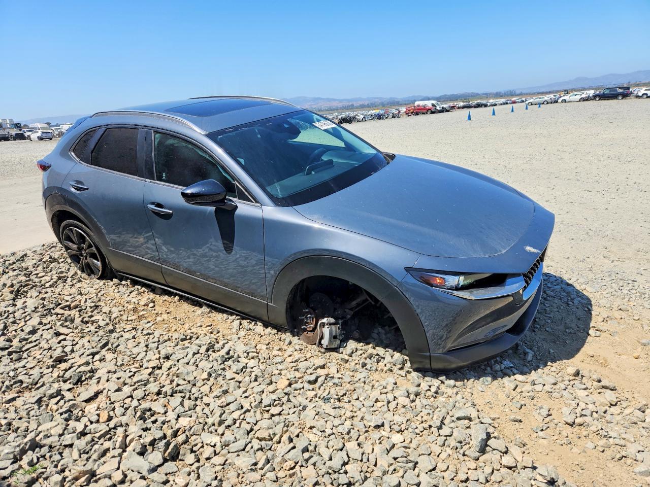 3MVDMBCM4PM560870 · 2023 MAZDA CX-30 · 4/13