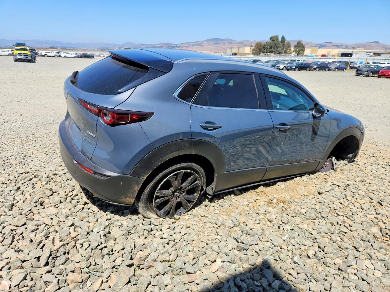 3MVDMBCM4PM560870 · 2023 MAZDA CX-30 · 3/13