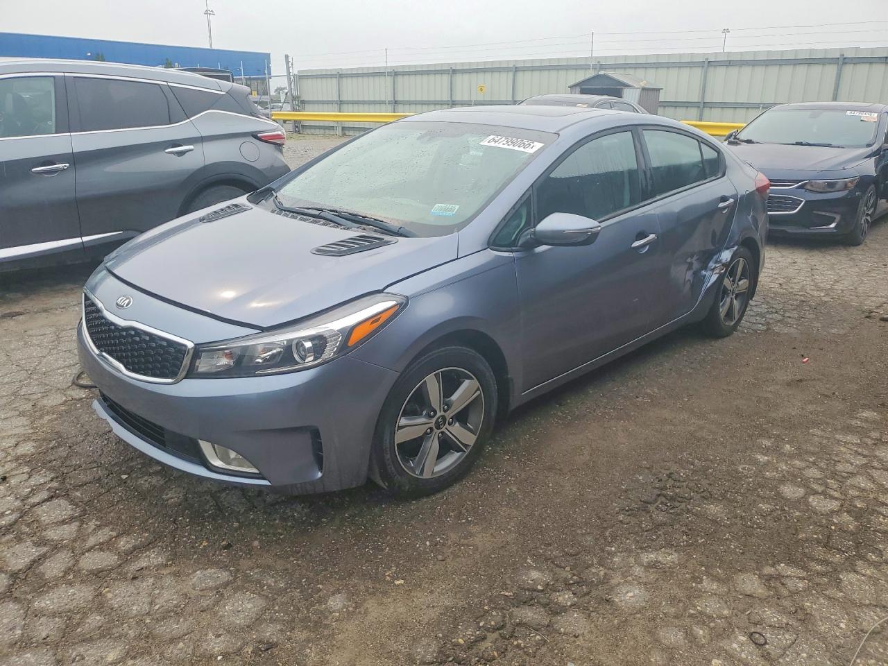 3KPFL4A75JE197535 · 2018 KIA FORTE