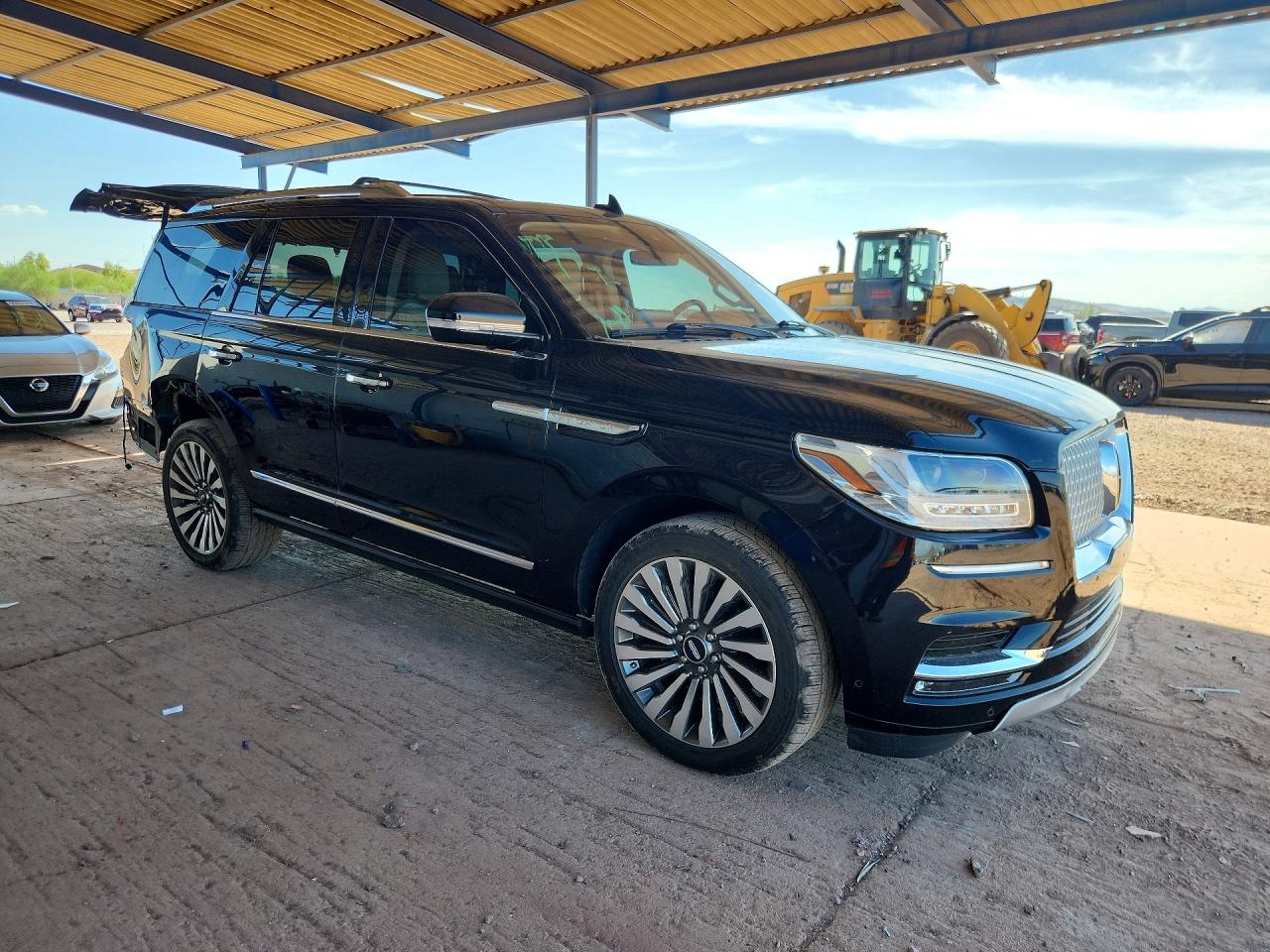 5LMJJ2LT0KEL24051 · 2019 LINCOLN NAVIGATOR · 4/13