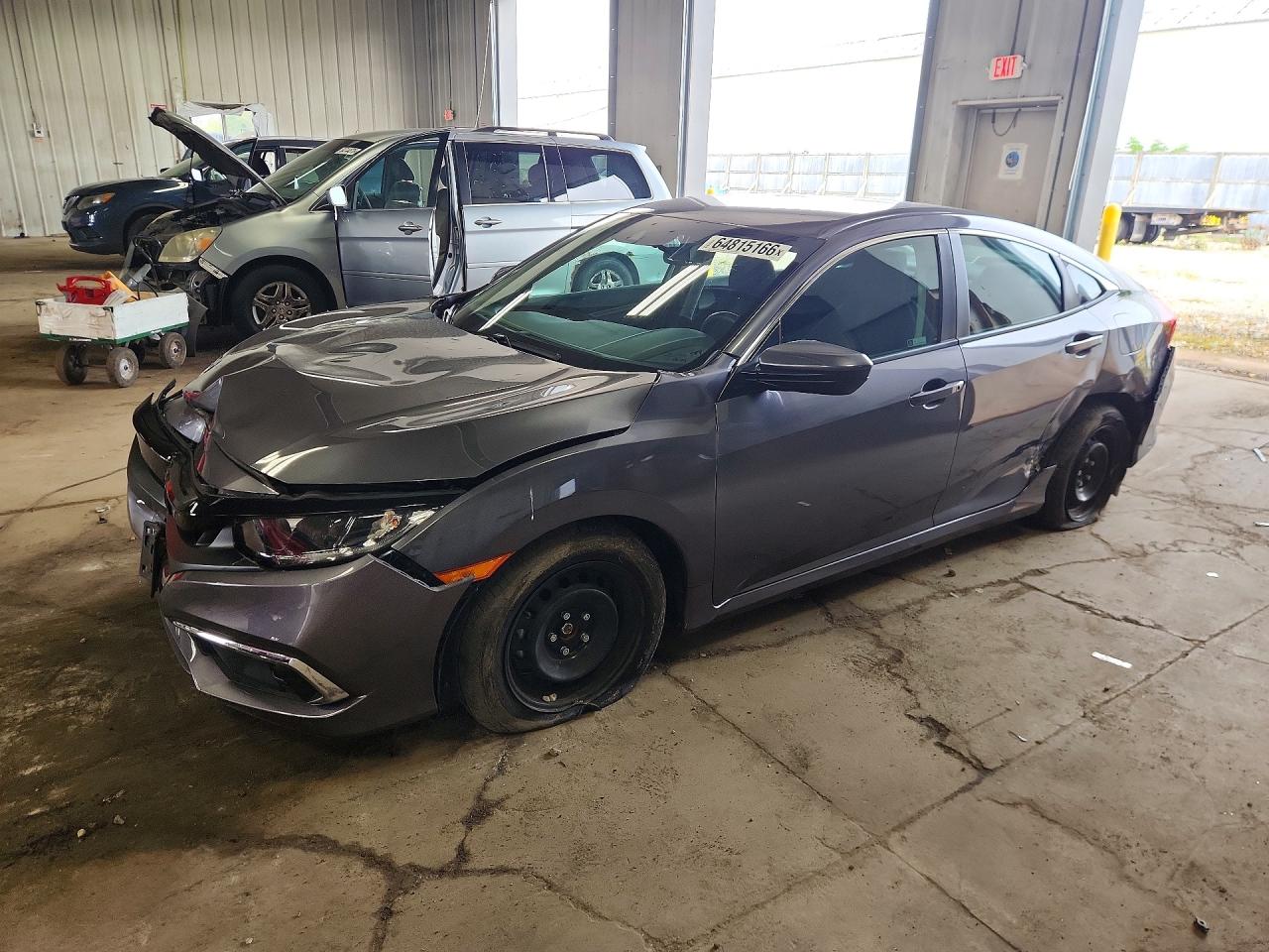 2HGFC2F61MH551355 · 2021 HONDA CIVIC