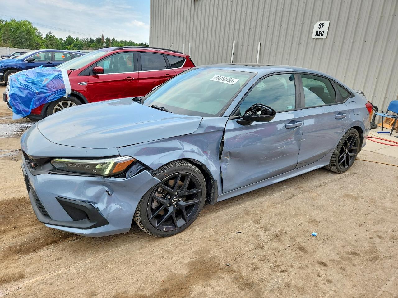 2HGFE1E57NH470357 · 2022 HONDA CIVIC