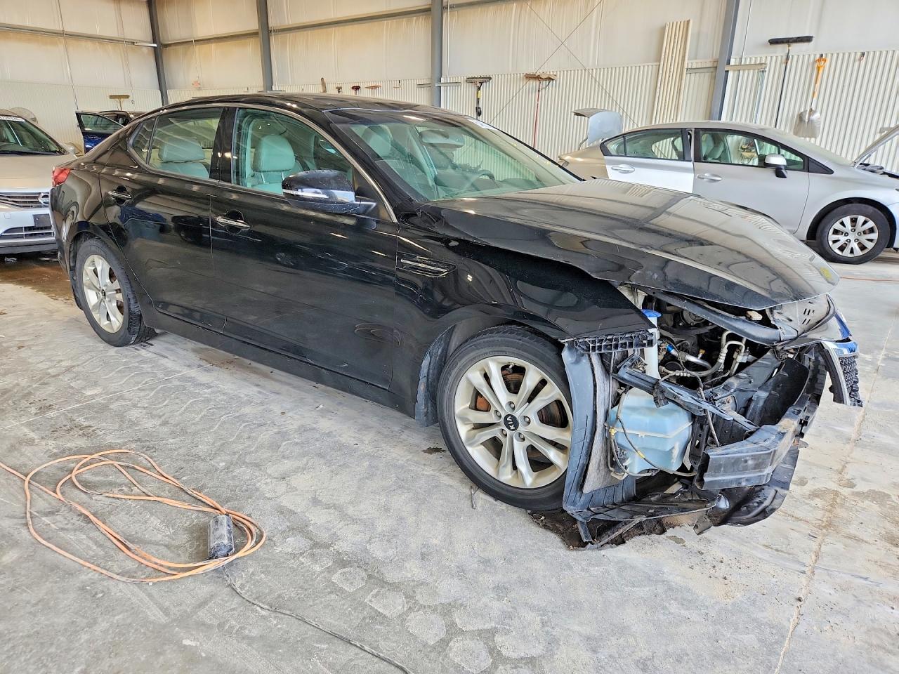 KNAGN4A72B5099720 · 2011 KIA OPTIMA · 4/13