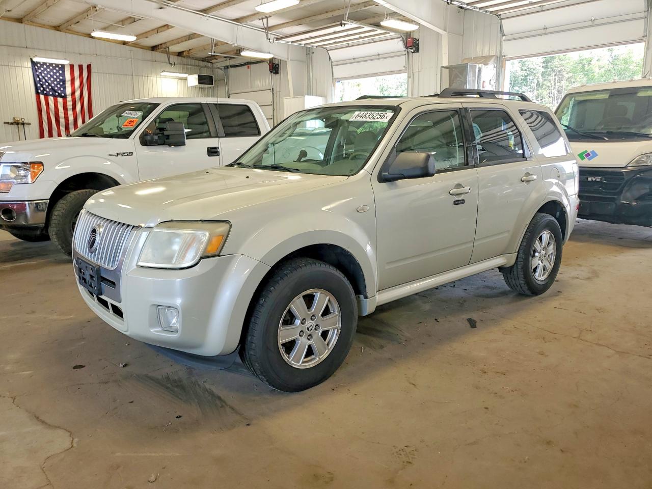 4M2CU81739KJ20513 · 2009 MERCURY MARINER