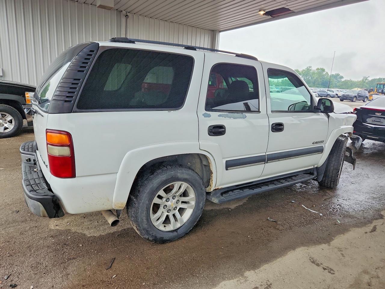 1GNEK13Z43J189712 · 2003 CHEVROLET TAHOE · 3/13