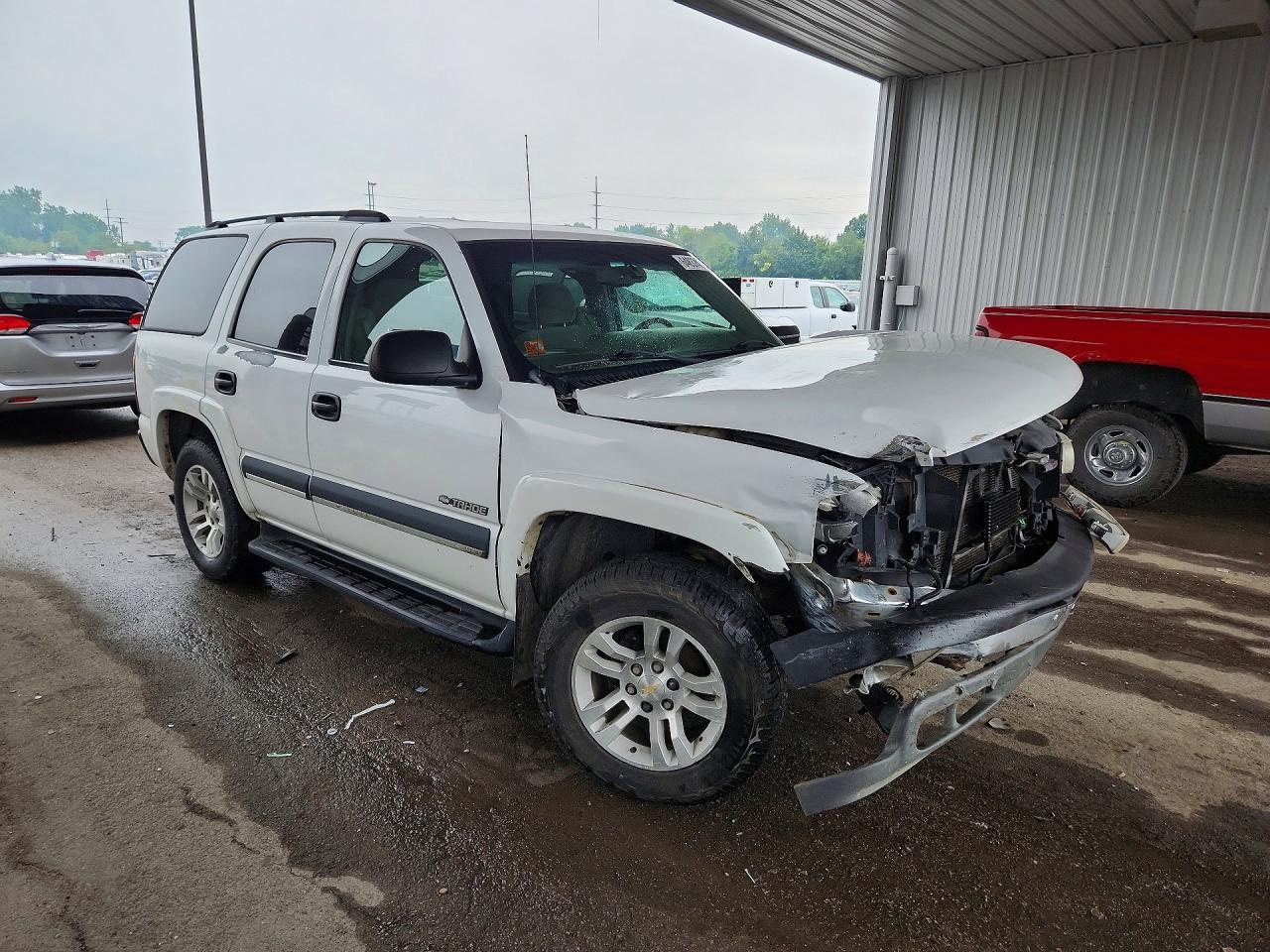 1GNEK13Z43J189712 · 2003 CHEVROLET TAHOE · 4/13
