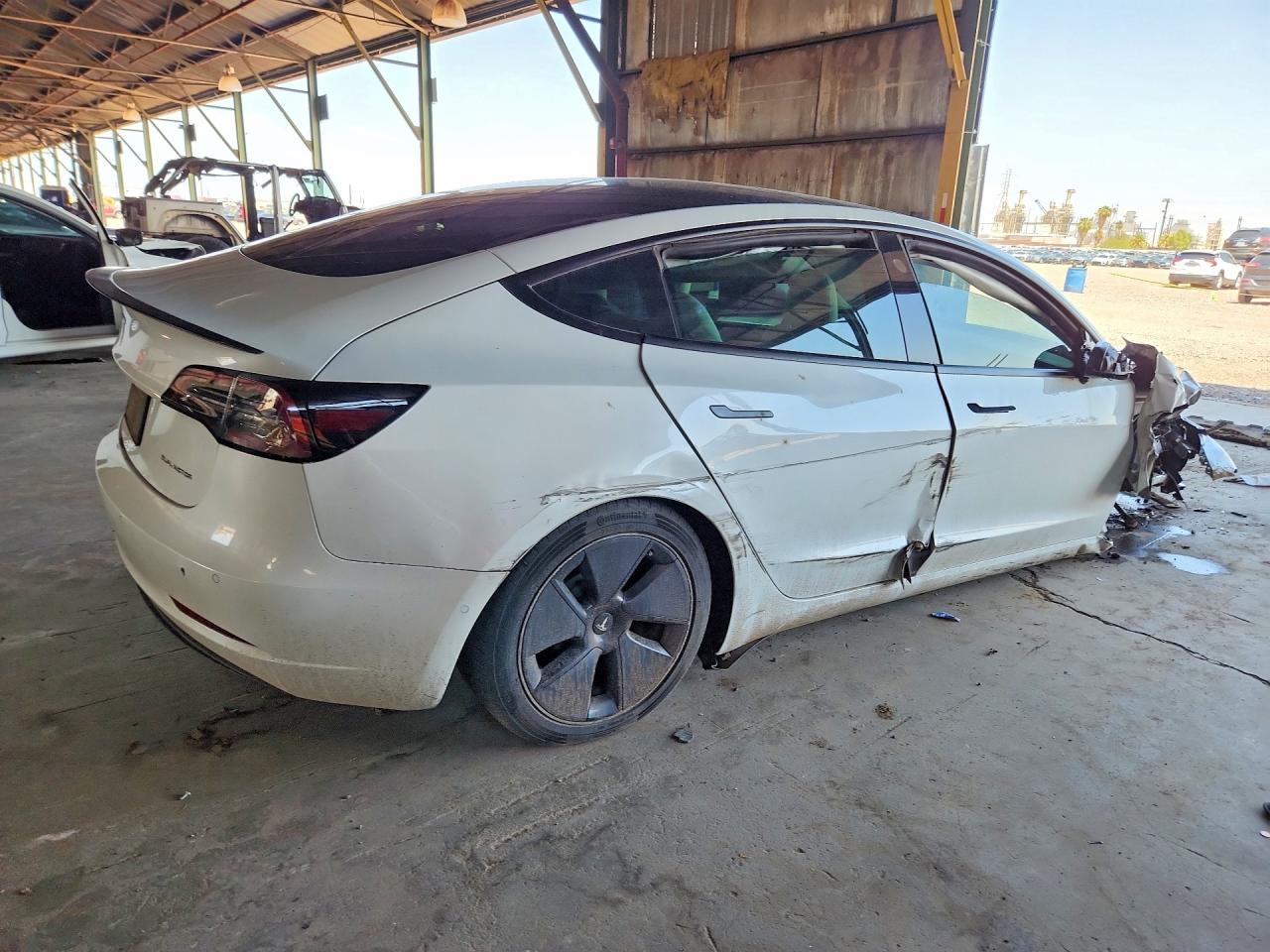 5YJ3E1EB5NF351610 · 2022 TESLA MODEL 3 · 3/13