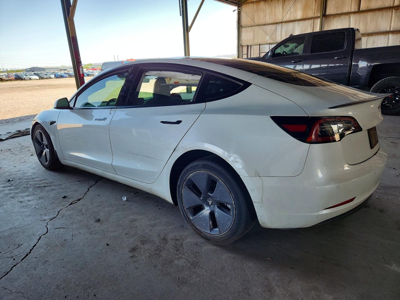 5YJ3E1EB5NF351610 · 2022 TESLA MODEL 3 · 2/13