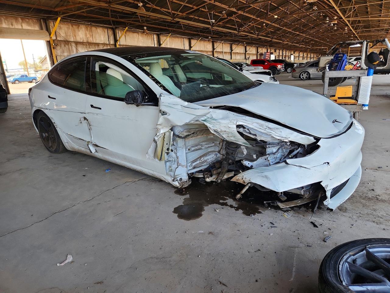5YJ3E1EB5NF351610 · 2022 TESLA MODEL 3 · 4/13