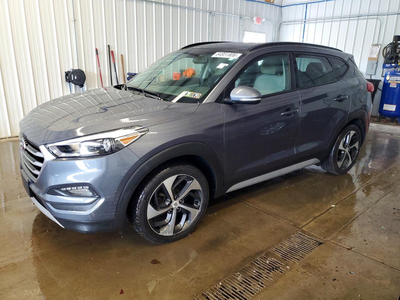KM8J3CA22JU690014 · 2018 HYUNDAI TUCSON