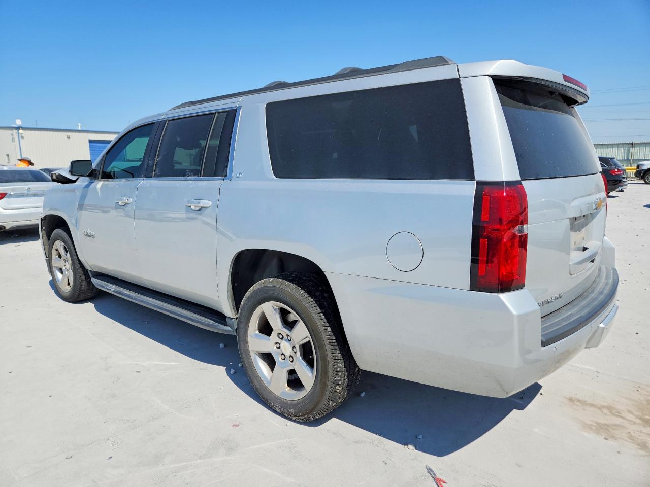 1GNSCHKC6KR148858 · 2019 CHEVROLET SUBURBAN · 2/13
