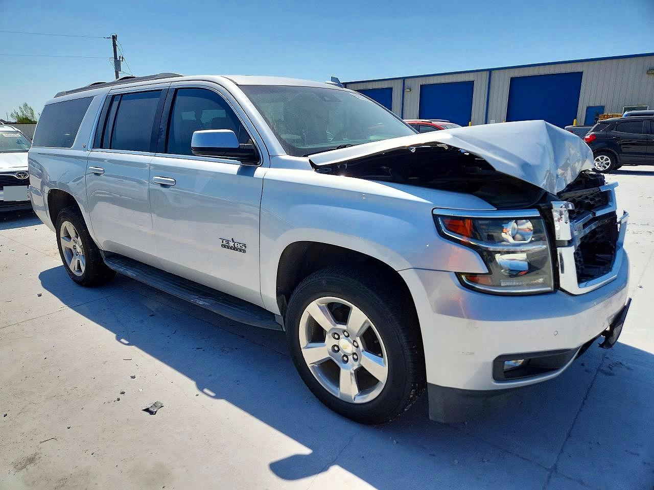 1GNSCHKC6KR148858 · 2019 CHEVROLET SUBURBAN · 4/13