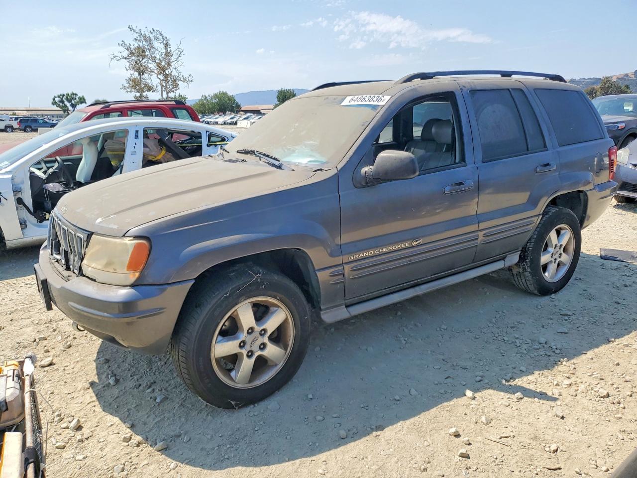 1J8GW68JX3C****** · 2003 JEEP GRAND CHEROKEE