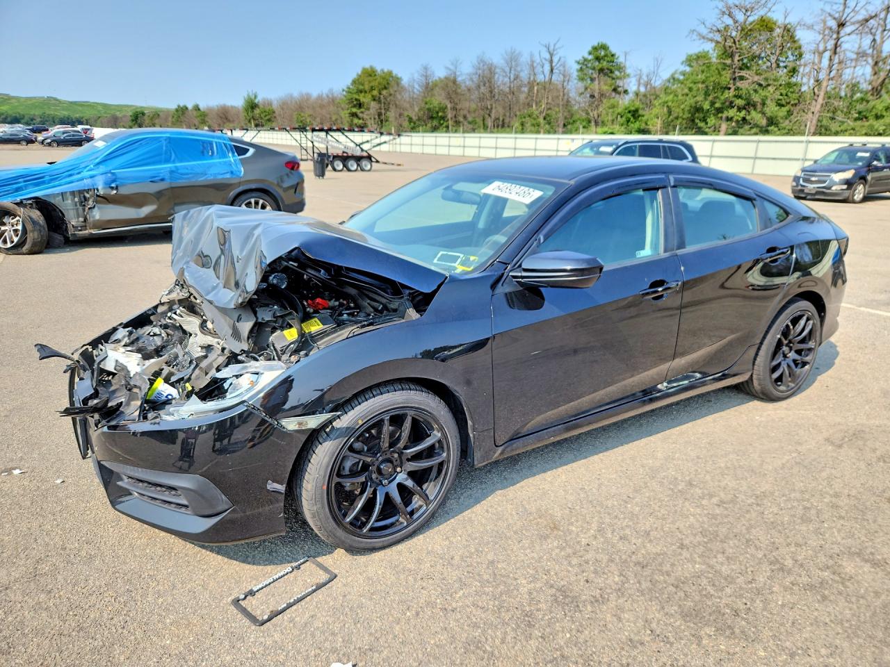2HGFC2F56JH574598 · 2018 HONDA CIVIC