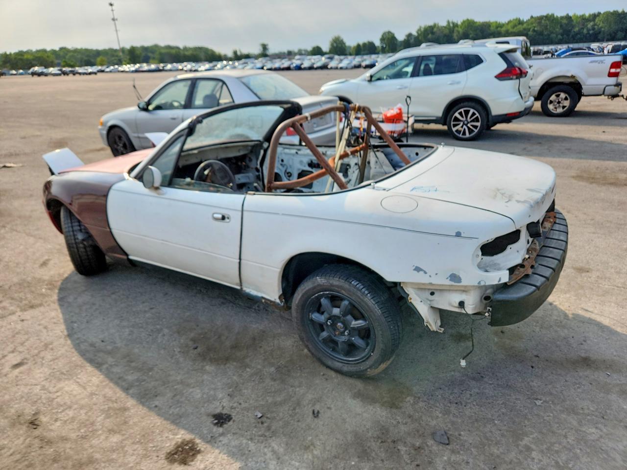 JM1NA3519P0412983 · 1993 MAZDA MX-5 MIATA · 2/12