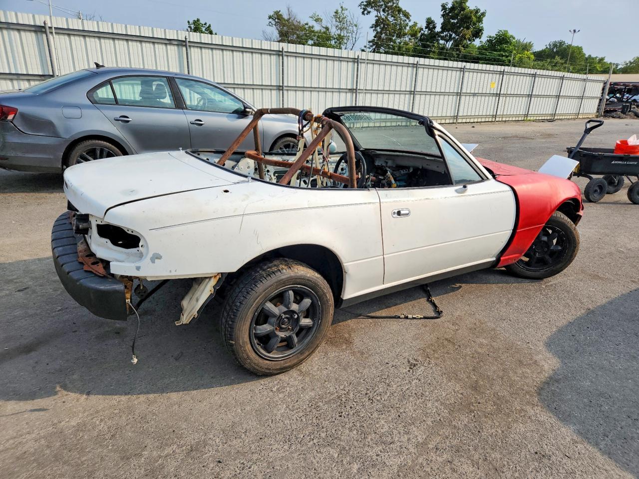 JM1NA3519P0412983 · 1993 MAZDA MX-5 MIATA · 3/12