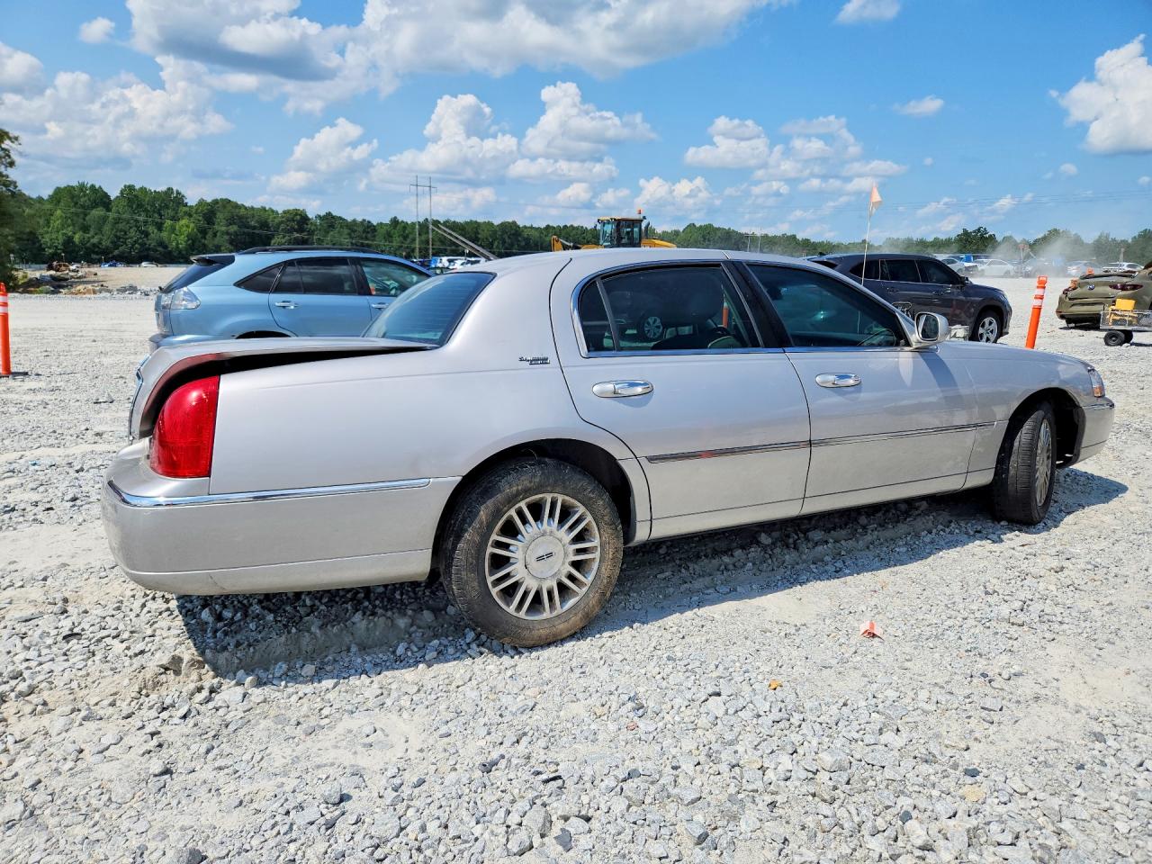 2LNBL8CV3BX761210 · 2011 LINCOLN TOWN CAR · 3/12