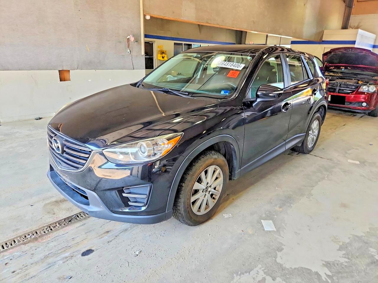 JM3KE4BY6G0879560 · 2016 MAZDA CX-5