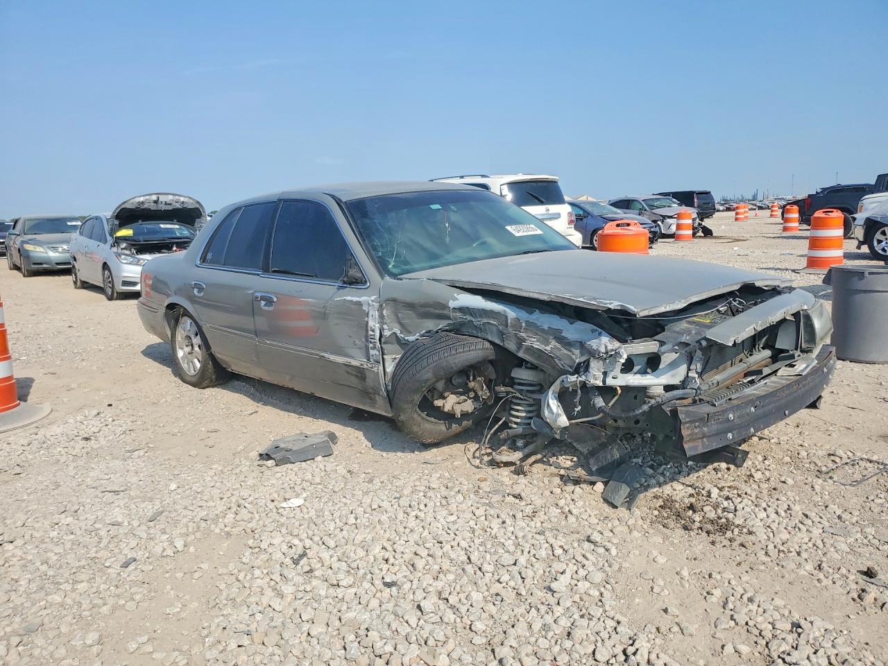 2MEFM75WX3X661821 · 2003 MERCURY GRAND MARQUIS · 4/12