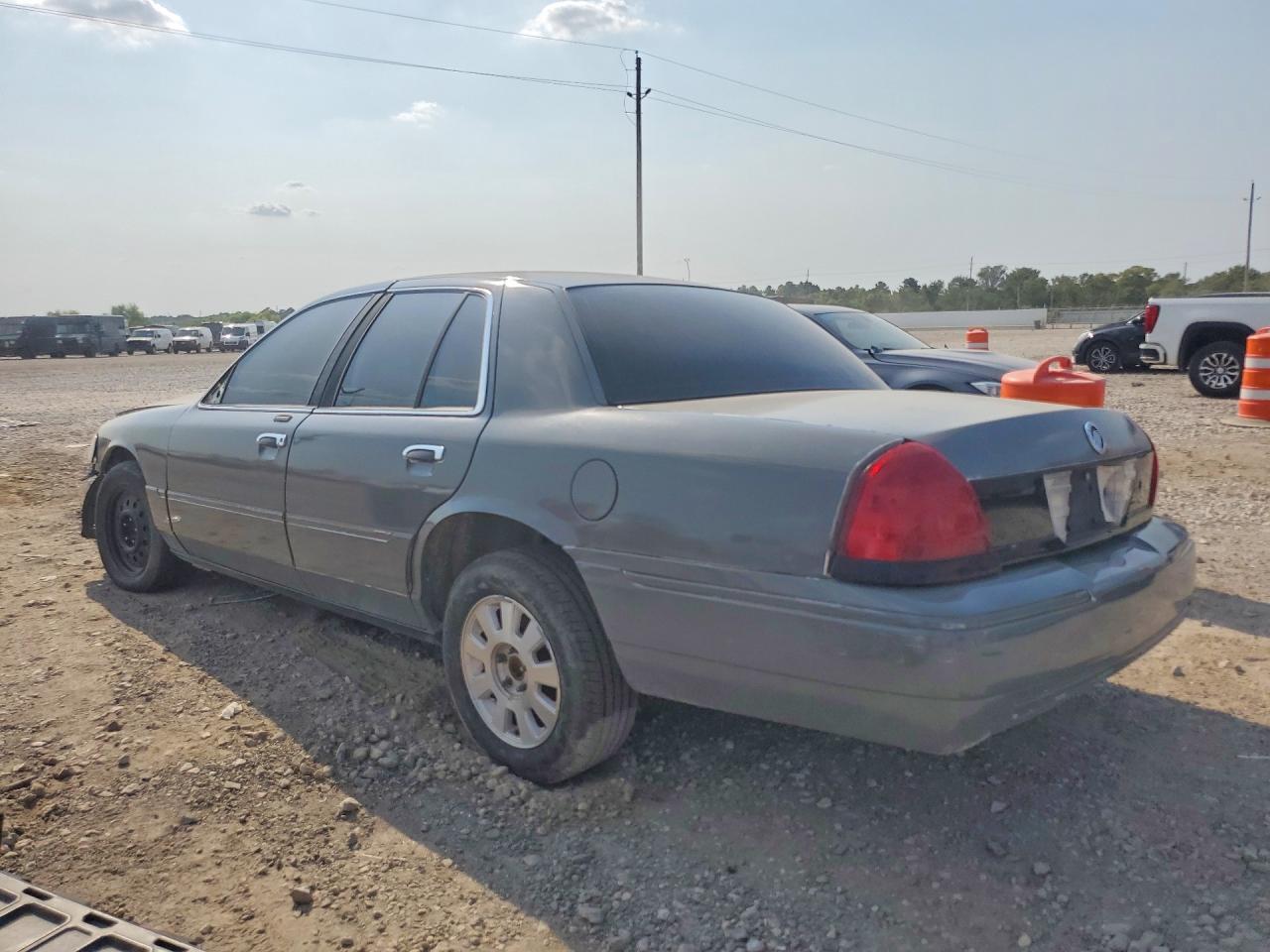 2MEFM75WX3X661821 · 2003 MERCURY GRAND MARQUIS · 2/12