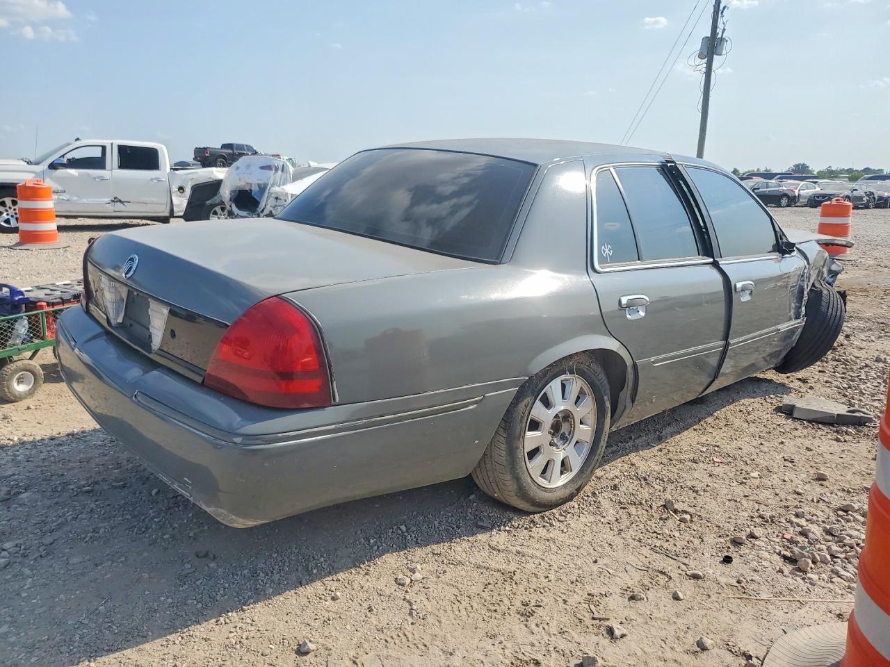 2MEFM75WX3X661821 · 2003 MERCURY GRAND MARQUIS · 3/12