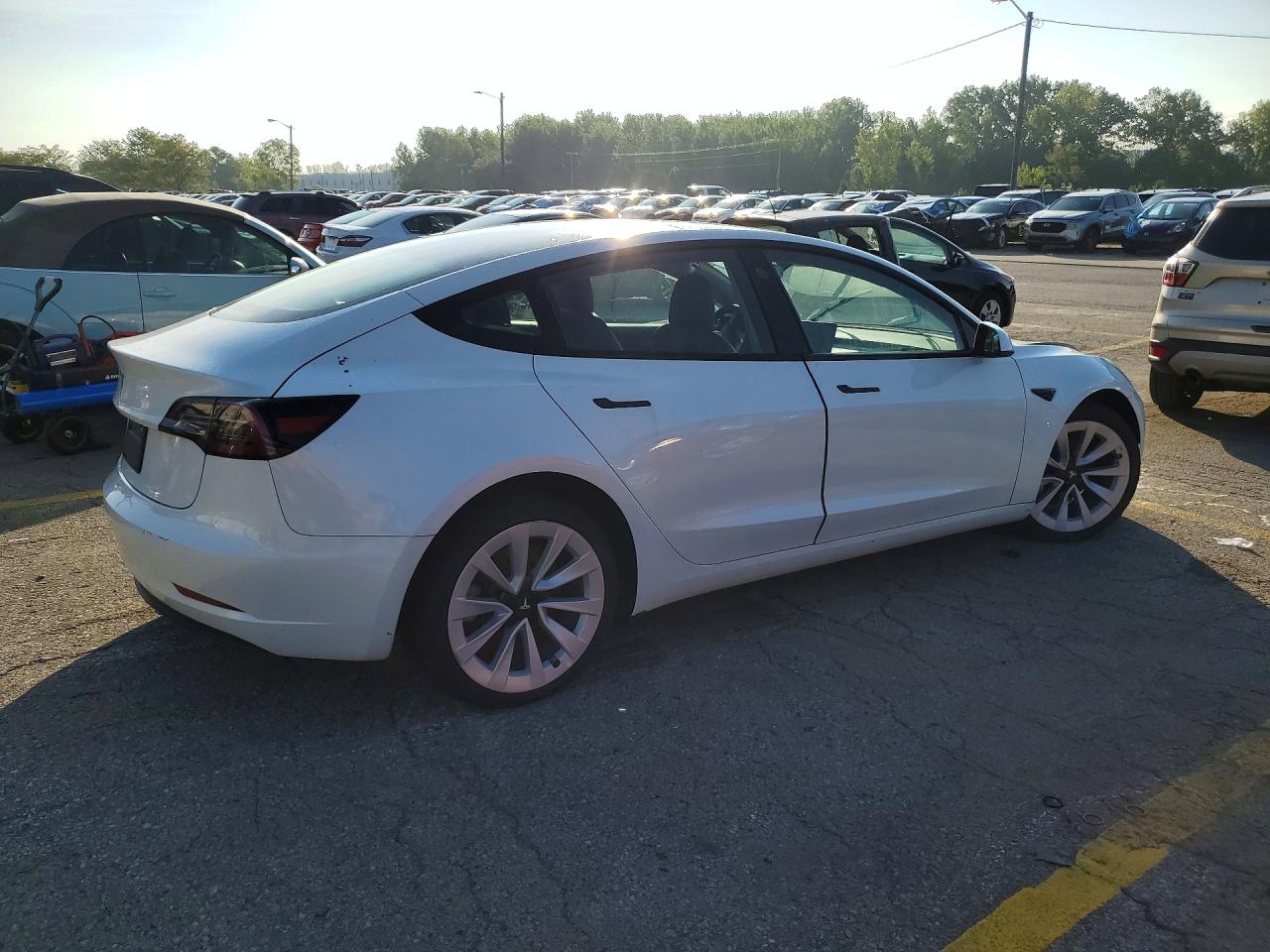 5YJ3E1EA9PF433446 · 2023 TESLA MODEL 3 · 3/12