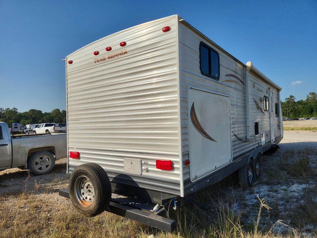 5SFEB332XDE263360 · 2013 HEARTLAND RV'S TRAIL RUNNER · 4/10