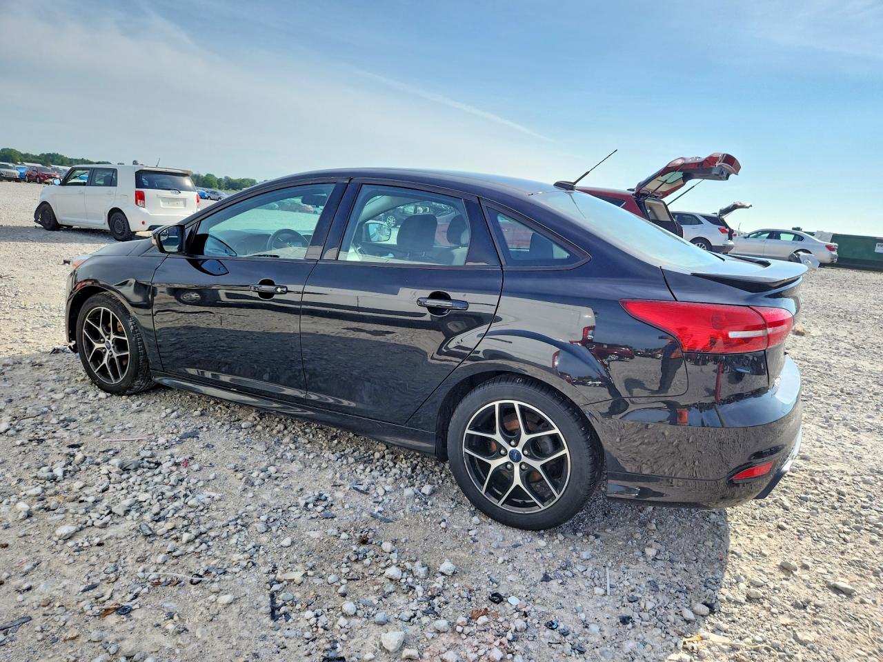 1FADP3F28FL386588 · 2015 FORD FOCUS · 2/12